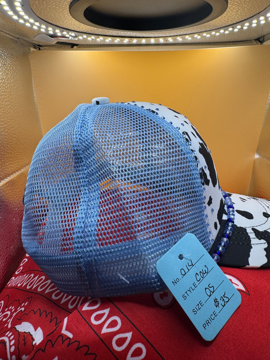 Powder blue cow print trucker